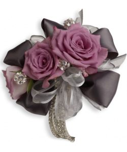 Lavender roses and romantic ribbons surrounded by classic rhinestones are simply spectacular.